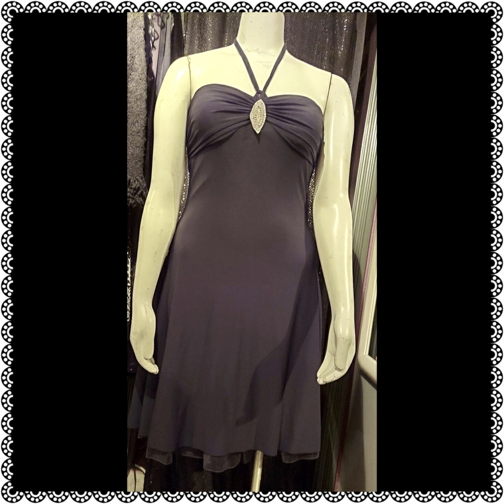Black cocktail dress with rhinestone accent
